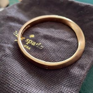 Kate Spade Rose Gold Do The Twist hinged bangle